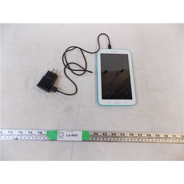 Samsung tablet with charging cord. Powers on