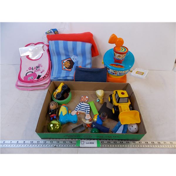 Assorted toys with bibs and blankets