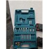 Image 2 : Basket of Makita cordless battery charger and various cordless batteries