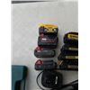 Image 8 : Basket of Makita cordless battery charger and various cordless batteries