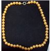 Image 1 : HAND KNOTTED YELLOW PEARLS IN VELVET CASE 18 INCH