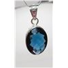 Image 1 : 6)  OVAL DARK BLUE CRYSTAL PENDANT SET IN A SILVER