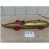 Image 1 : 1920 Buffalo Silver Bullet Pressed Metal Racecar with pull out wind up working gold in color 26" lon