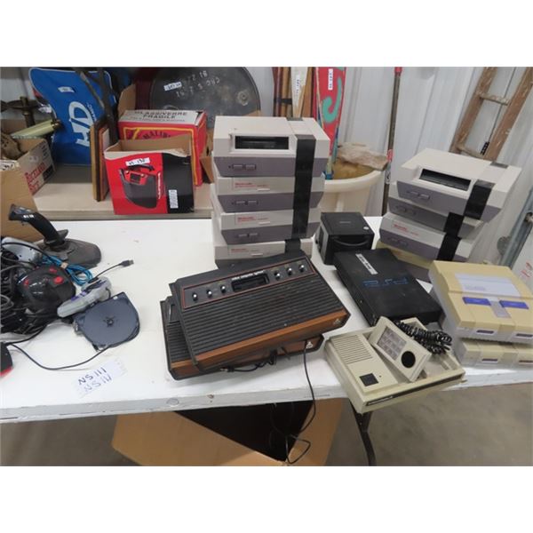 16 non working Atari, Nintendo, Game Cube, PS2 Consoles