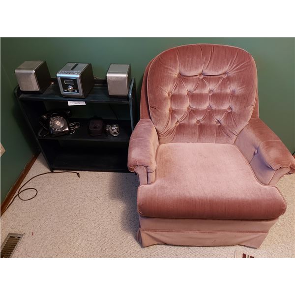 Bookshelf, rose-coloured upholstered swivel chair, Durabrand radio/CD player with speakers, camera w