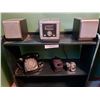 Image 2 : Bookshelf, rose-coloured upholstered swivel chair, Durabrand radio/CD player with speakers, camera w