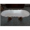 Image 1 : Marble top coffee table with cherub brass coloured legs