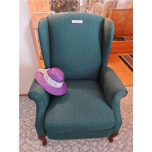 Vintage green upholstered wingback recliner; sunhat