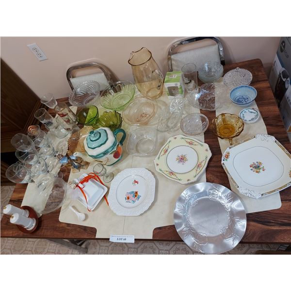 Glass water pitcher, covered butter dish, decorative plates, teapot, 2 salt & pepper sets, serving b