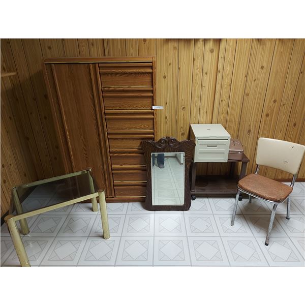 Smoked-glass topped table with brass coloured legs; bedroom cabinet - wood veneer; side table on whe