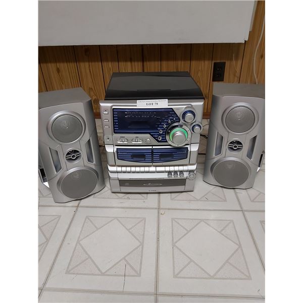 Curtis AM/FM stereo, 3 CD changer, double cassette with 2 speakers, with turntable
