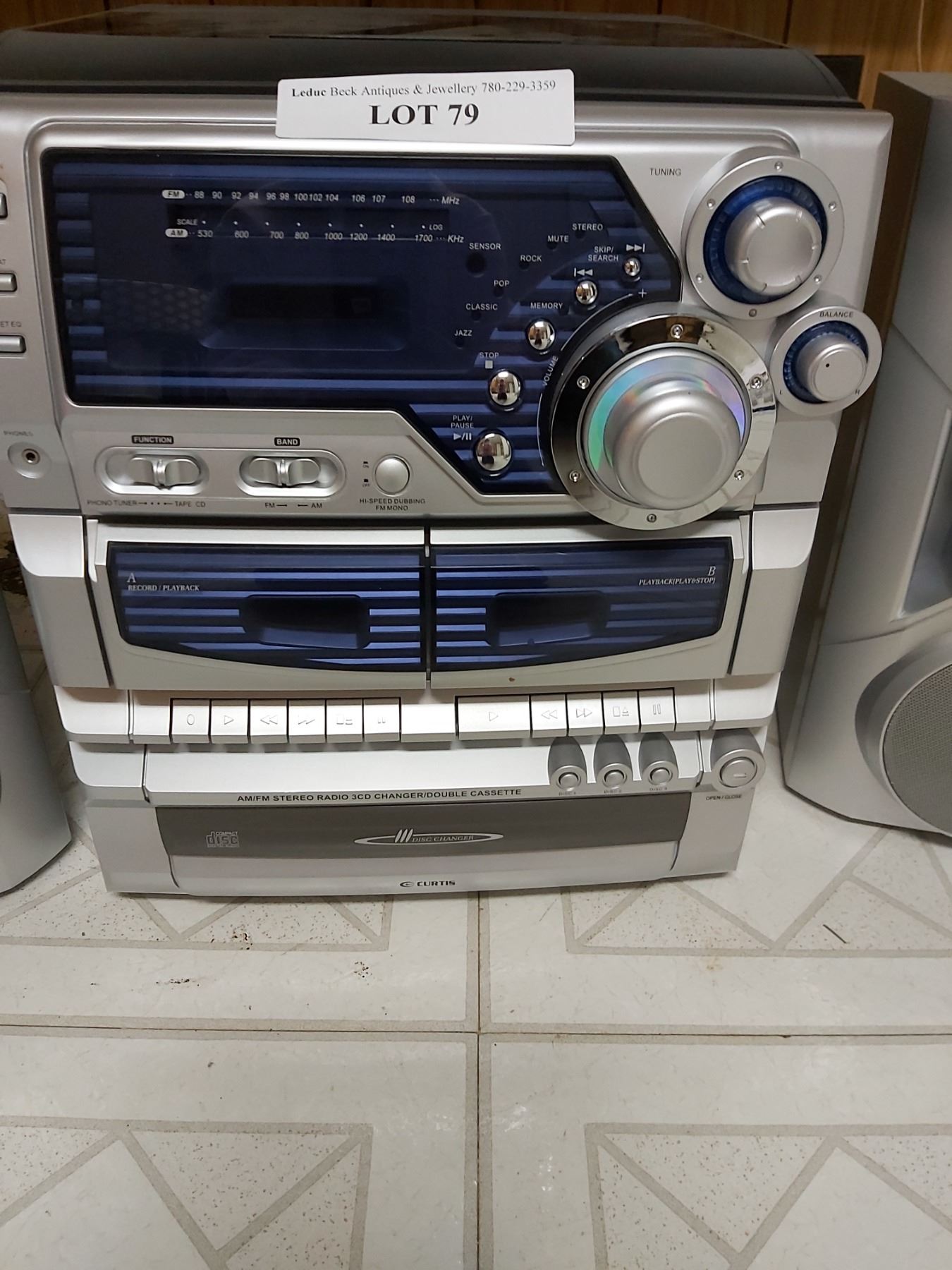 Curtis AM/FM stereo, 3 CD changer, double cassette with 2 speakers ...
