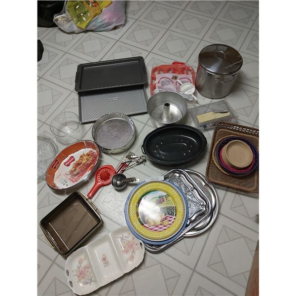 Kitchen lot incl cookie trays, cake pans, baskets, serving trays, pierogi maker large pot