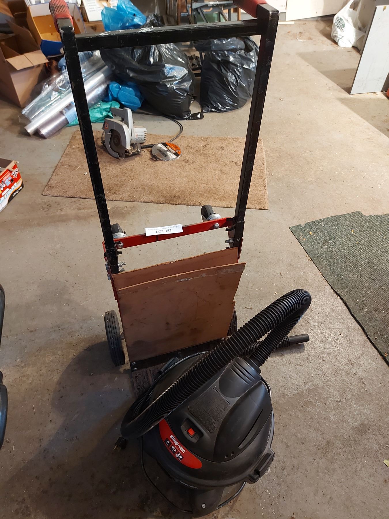 Dolly with 2 wheels; Shopvac with hose