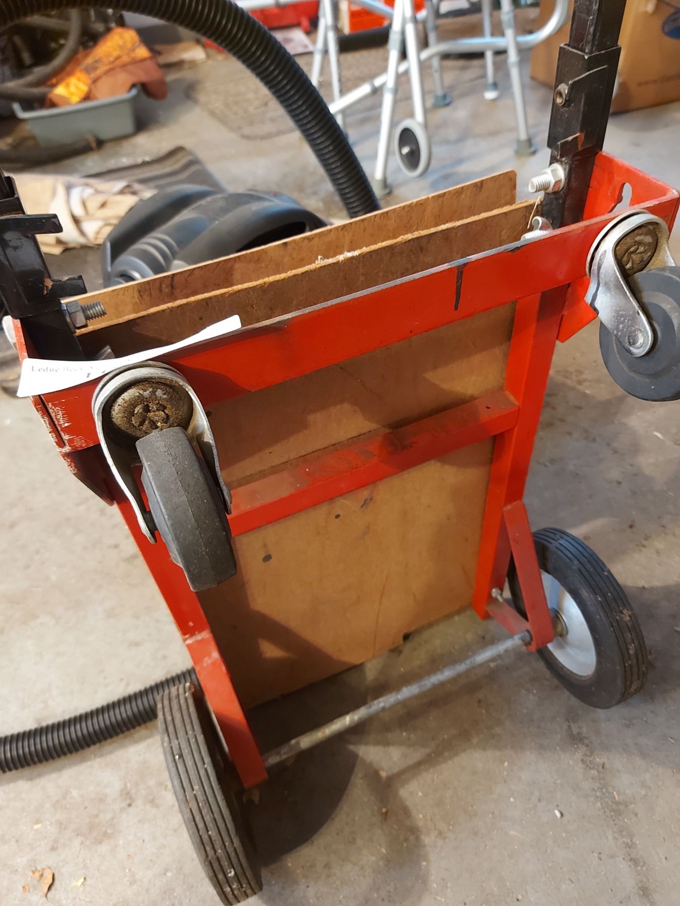 Dolly with 2 wheels; Shopvac with hose