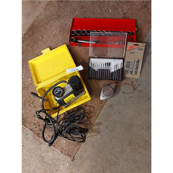 Socket wrench set; precision screwdriver set; chalkline; inter-compressor with box, cords; jigsaw bl
