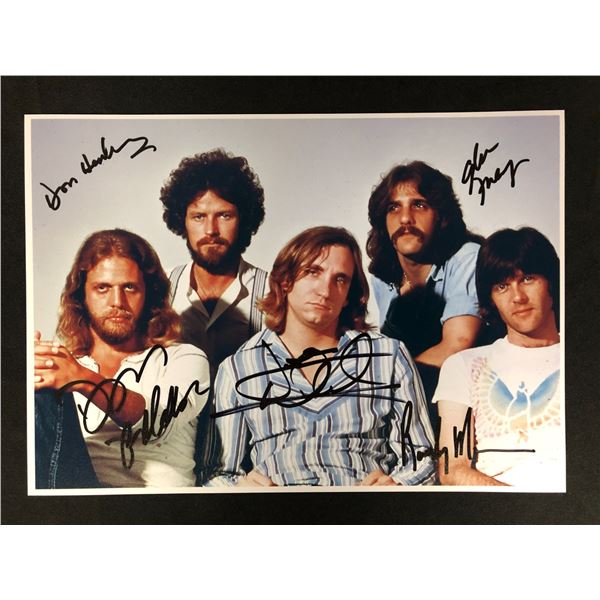 EAGLES BAND SIGNED 8X10 PHOTO (RA COA)