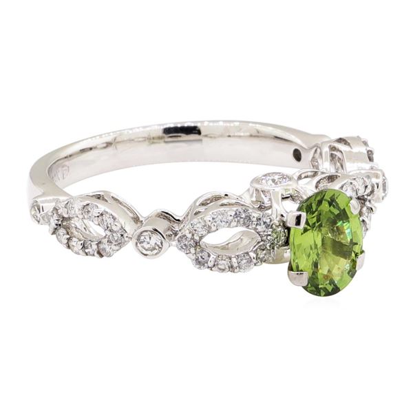 1.24 ctw Oval Mixed Demantoid Garnet And Round Brilliant Cut Diamond Ring - 14KT