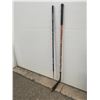 Image 1 : Two hockey sticks