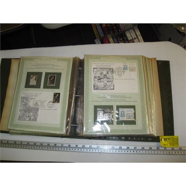 BINDER OF FIRST DAY ISSUE STAMPS WITH SILVER PLATED STAMP