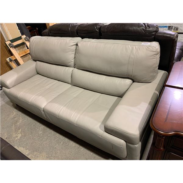 NEW California Design Tan Leather 2 seater sofa ( small rip on top of cushion as pictured)