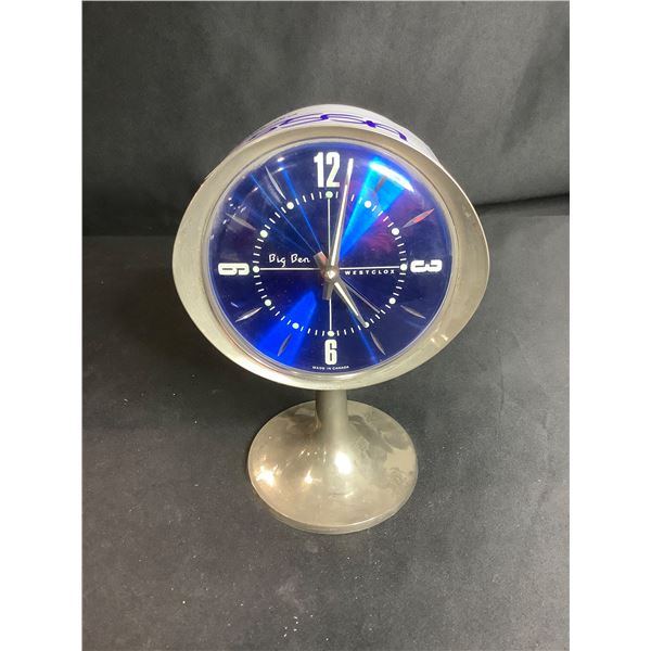 WESTCLOX BLUE BIG BEN ALARM OVAL CLOCK ON TALL PEDESTAL WITH ROUND BASE.