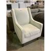 Image 1 : WHITE STUDDED LOUNGE CHAIR