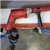 Image 3 : MILWAUKEE HEAVY DUTY SCREW GUN WITH ROOFING ATTACHMENT WORKING