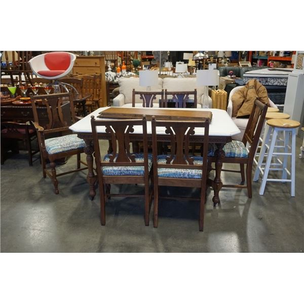 ANTIQUE CARVED DINING TABLE WITH 3 LEAFS AND 6 CHAIRS - REUPHOLSTERED CHAIRS