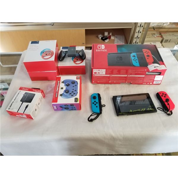 COMPLETE NINTENDO SWITCH CONSOLE WITH SWITCHPAD MINI CONTROLLER, ADDITIONAL CHARGER AND WHEEL TWIN P