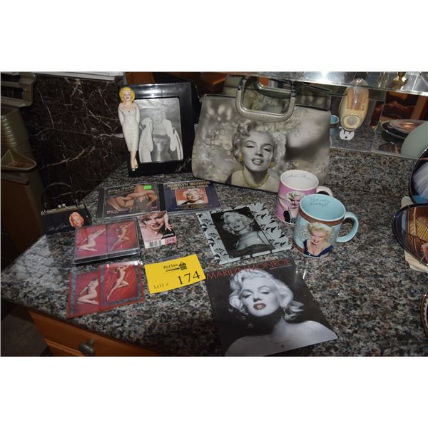 MARILYN MONROE COLLECTIBLES: HAND BAG, COIN PURSE, FRAMED PHOTO, PLAYING CARDS, MUGS, ASHTRAY, CD, C