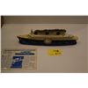 Image 1 : CHINA MANTLE CLOCK IN THE SHAPE OF THE NORMANDIE (21" X 5 1/2" X 3")