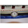 Image 3 : CHINA MANTLE CLOCK IN THE SHAPE OF THE NORMANDIE (21" X 5 1/2" X 3")