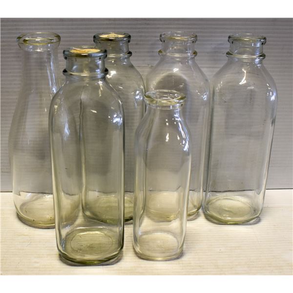VINTAGE GLASS MILK BOTTLES (7) WITH LIDS