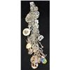 Image 1 : STERLING SILVER CHARM BRACELET W/ 31 CHARMS