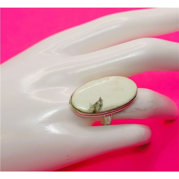 16)  OVAL NATURAL WHITE JASPER STATEMENT RING