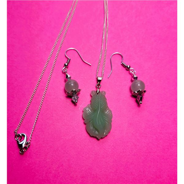 28)  PALE GREEN NATURAL ADVENTURINE CARVED