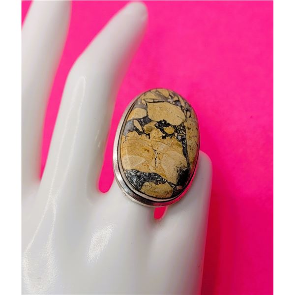 8)  NATURAL OVAL JASPER STATEMENT RING,  SIZE 7.