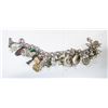Image 1 : HEAVY .925 SILVER BRACELET WITH 32 SILVER CHARMS