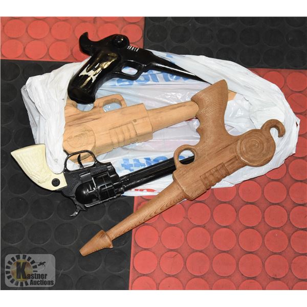 BUNTLINE CAP GUN AND THREE CARVED SPACE GUNS
