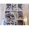 Image 4 : Hockey and tennis cards in sleeves - hockey cards have blue tac on them all