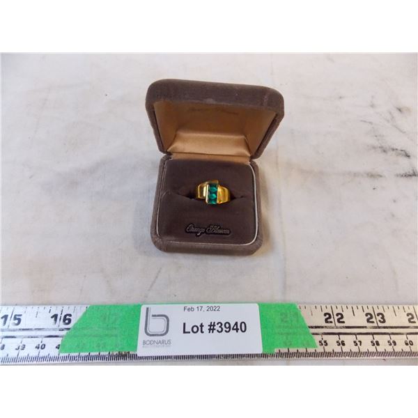 Ring marked “10k” size 9
