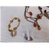 Image 2 : Polished stone, seeds and wood jewelry (12)