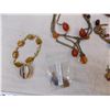Image 3 : Polished stone, seeds and wood jewelry (12)