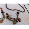 Image 4 : Polished stone, seeds and wood jewelry (12)