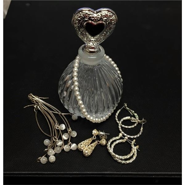 Perfume bottle and Jewelry as shown in photo