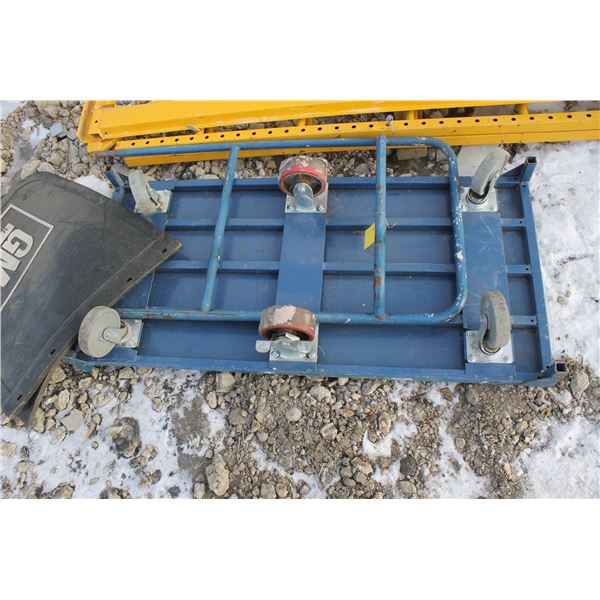 Six wheeled blue cart and 2 GM mudflaps