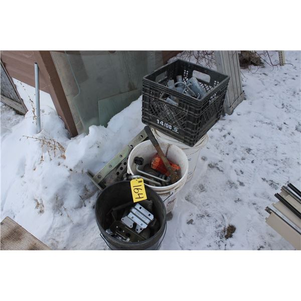 Three containers of fence parts,jack handles, and hinges