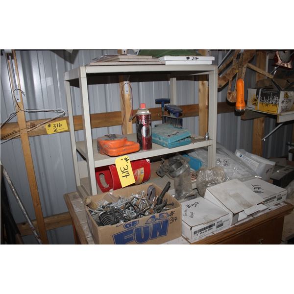 LARGE QTY OF MISC. ON THE EAST WALL INCLUDING ON THE COUNTER AND IN THE COUNTER