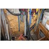 Image 4 : QTY OF TOOLS, SAFETY HARNESS, THREADED ROD, TELEPOSTS, SAFETY BELTS AND MISC. AGAINST WEST WALL